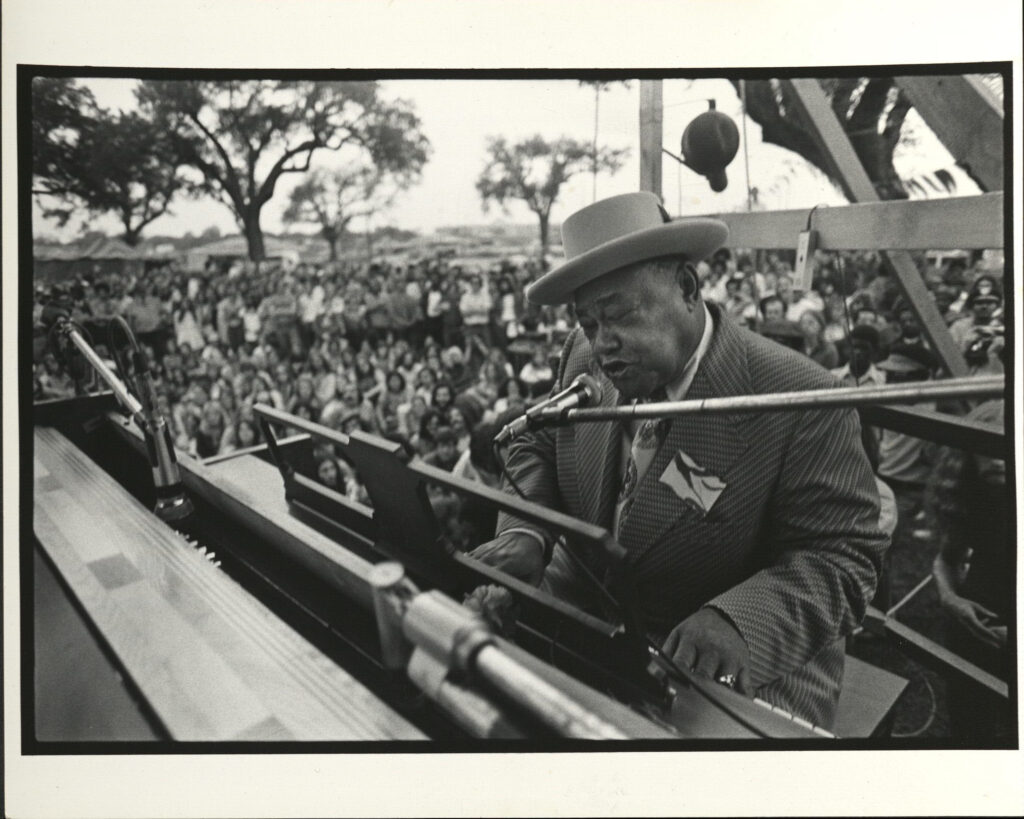 Roosevelt Sykes at piano, 1974, New Orleans Jazz & Heritage Festival, photographer: Michael P. Smith, Robert Palmer collection HJA-027, Box 268, 219.8572, Tulane University Special Collections.