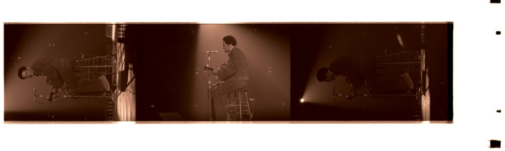 Negative strip of Bill Withers, appearing as a last-minute substitution for Donny Hathaway at the Jazz Fest night concert on Saturday, April 20, 1974, Municipal Auditorium, photographer unidentified, Tad Jones collection HJA-056, Box 28, Tulane University Special Collections.