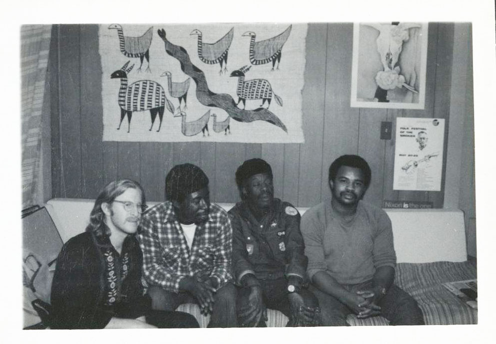 Photo of l. to. r.: Quint Davis, Alfred “Uganda” Roberts,” Professor Longhair, unidentified man, circa 1970s, location and photographer unidentified, Allison Miner papers HJA-039, “Photos” box, Tulane University Special Collections.