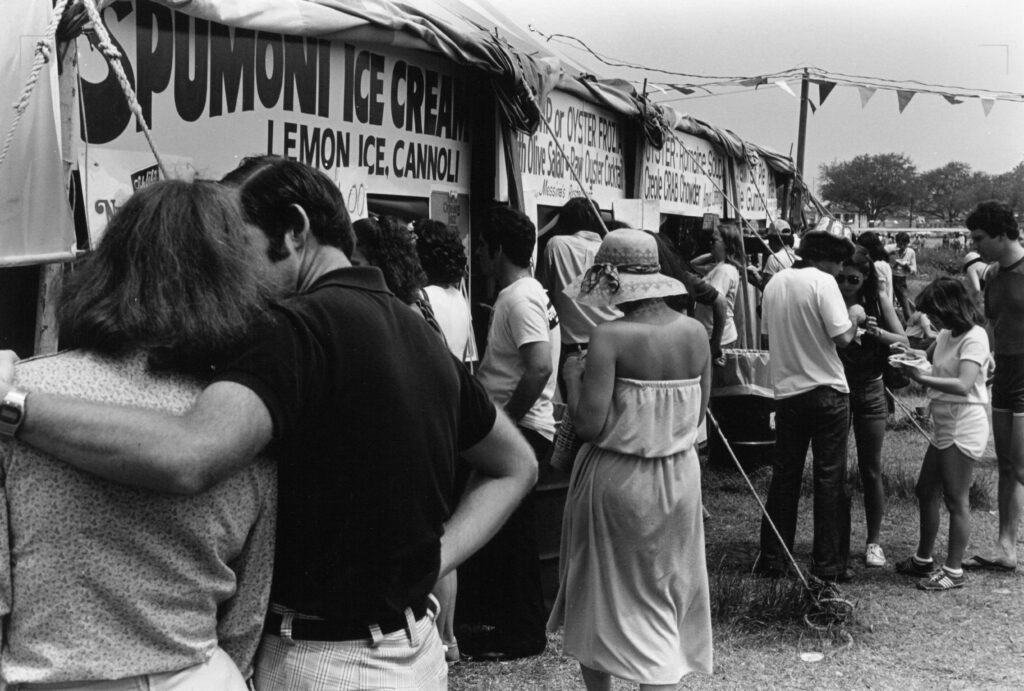 Food booth at Jazz Fest, 1979, photographer: Graham Anthony or Tony Zucker, Jambalaya yearbook for Tulane University, p. 122, Tulane University Special Collections.