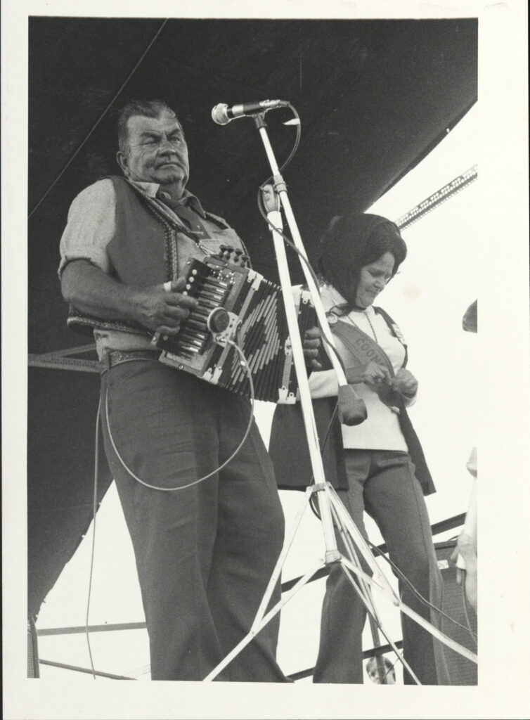 Nathan Abshire performs at Jazz Fest, undated circa 1970s, photographer: Harriet Blum, Louisiana Image Collection LaRC-1081, Box 26, Folder 10, Tulane University Special Collections.