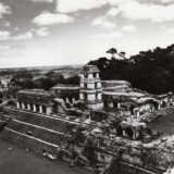 Black and white photograph of a stone temple complex