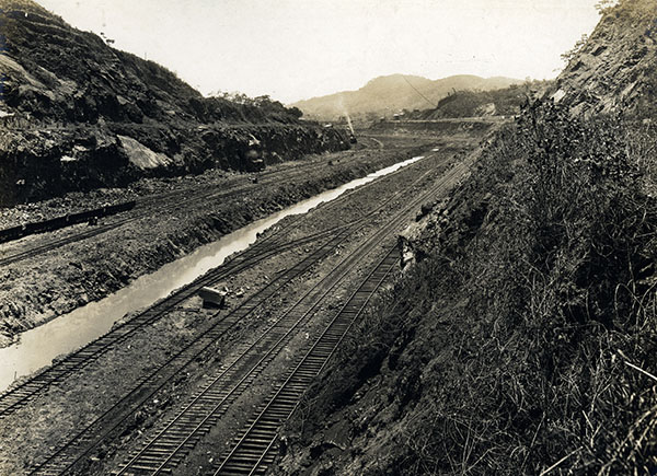 Train tracks through a mountain range.