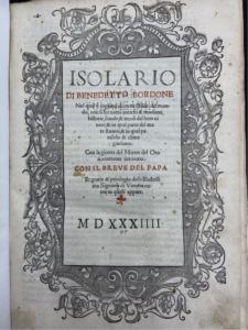 Frontispiece, Benedetto Bordone, Isolario di Benedetto Bordone nel qual si ragiona di tutte l'isole del mondo, con li lor nomi antichi & moderni, historie, fauole, & modi del loro viuere… . The title, date, and creator of the Isolario is set and printed in the center of the page, surrounded by a decorative rectagular border that contains flourishes of flowers, leaves, and vines.