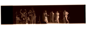Negative strip of (left) Herbie Hancock and the Headhunters at the Jazz Fest night concert on Friday, April 19, 1974, Municipal Auditorium; and (right) Gladys Knight and The Pips performing at the Jazz Fest night concert on Friday, April 19, 1974, Municipal Auditorium, photographer unidentified, Tad Jones collection HJA-056, Box 28, Tulane University Special Collections.