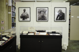 View of Daniel Chauche’s photos about exhibit cases 3 and 4.