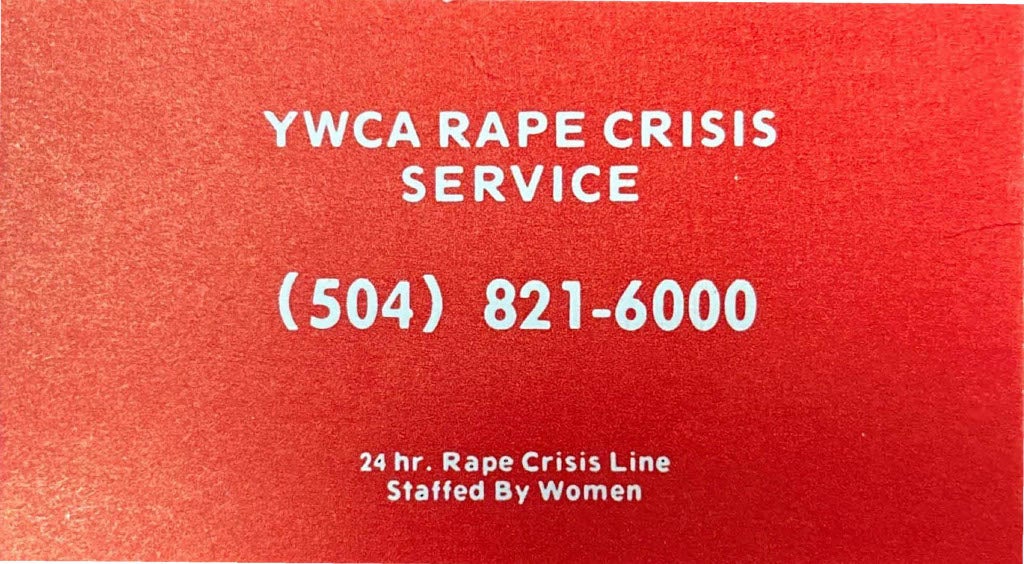 Young Women's Christian Association red card with their rape crisis service phone number. 